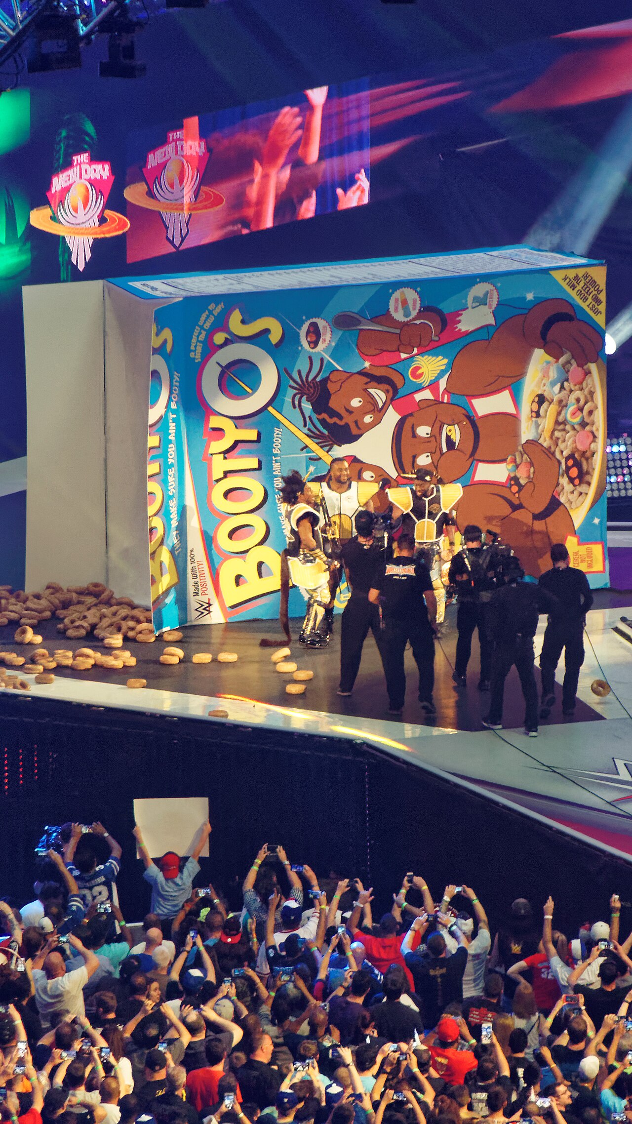 The New Day 3 Kofi Kingston, Xavier Woods and Big E during The New Day entrance at WrestleMania 32